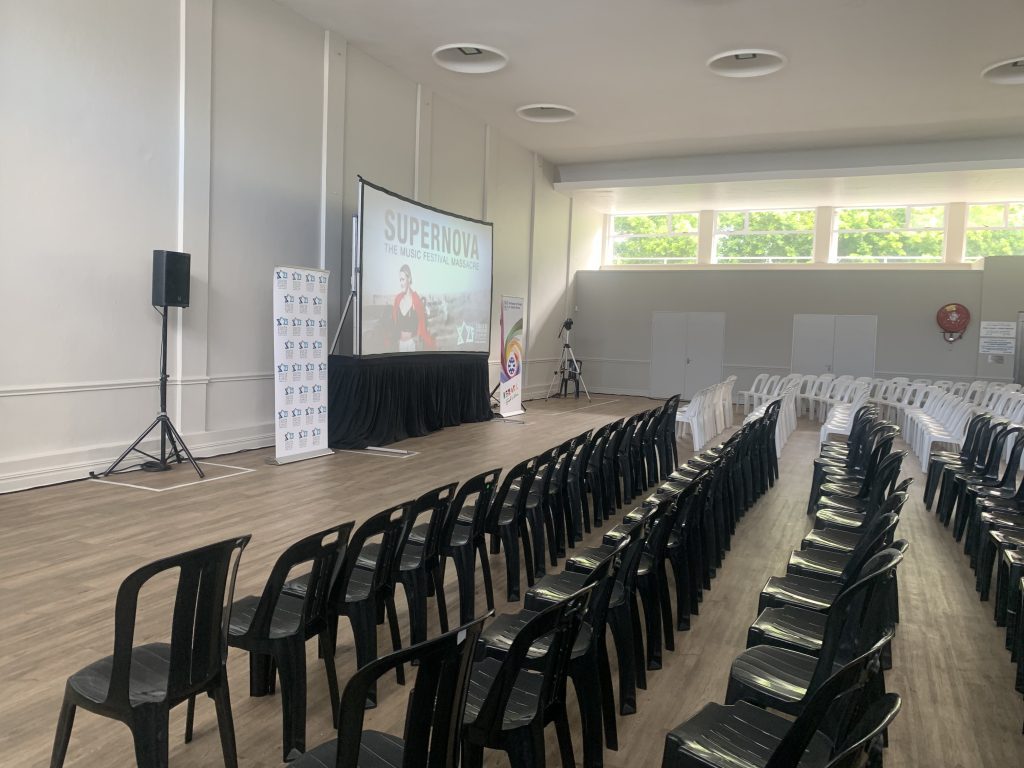 a room with rows of chairs